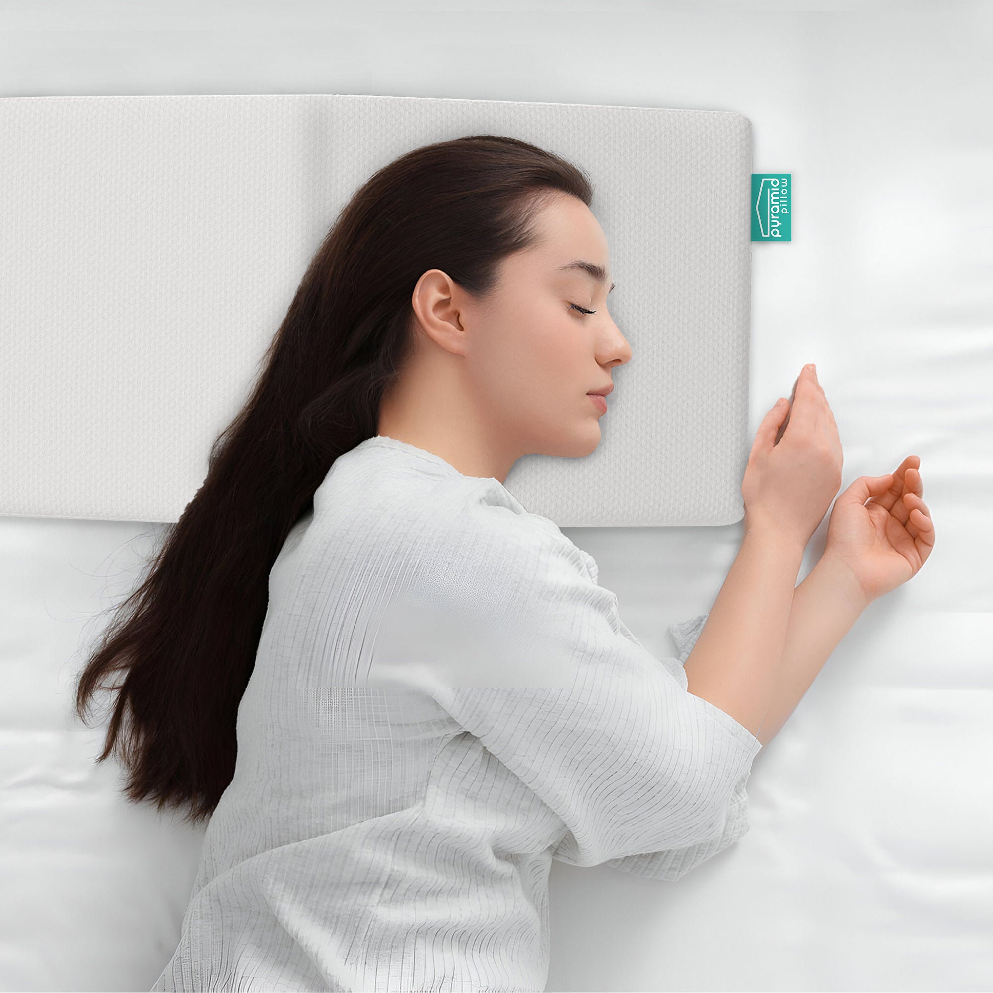 Woman sleeping on anti-snoring Pyramid Pillow